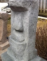 Grey rock garden statue
